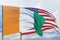 Waving American flag and flag of Cote Ivoire. Closeup view, 3D illustration.