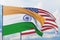 Waving American flag and flag of India. Closeup view, 3D illustration.