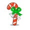 Waving candy cane isolated in the character