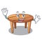 Waving cartoon round wooden table in cafe
