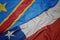waving colorful flag of chile and national flag of democratic republic of the congo