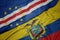 waving colorful flag of ecuador and national flag of cape verde