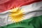 Waving colorful flag of kurdistan.