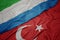 waving colorful flag of turkey and national flag of sierra leone