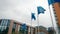 Waving European Union Flags near EU Commission Office in Brussels, Belgium