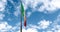 Waving fabric texture of the tricolor flag of italy on blue sky with white clouds moving on the wind,