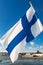 Waving Finnish Flag against Helsinki FInland