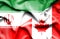 Waving flag of Canada and Iran