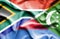 Waving flag of Comoros and South Africa