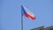 Waving flag of the Czech Republic on blue sky