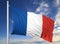 Waving flag of France on flagpole