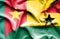 Waving flag of Ghana and Cameroon