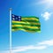 Waving flag of Goias is a state of Brazil on flagpole