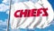 Waving flag with Kansas City Chiefs professional team logo. 4K editorial clip