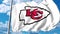 Waving flag with Kansas City Chiefs professional team logo. 4K editorial clip