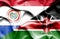 Waving flag of Kenya and Paraguay