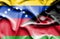 Waving flag of Malawi and Venezuela