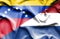 Waving flag of Netherlands and Venezuela