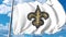Waving flag with New Orleans Saints professional team logo. 4K editorial clip