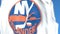 Waving flag with New York Islanders NHL hockey team logo, close-up. Editorial 3D rendering