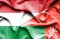 Waving flag of Oman and Hungary