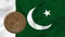 Waving flag of Pakistan and rotating reverse of 1 rupee Pakistan coin. 3d animation in 4k video.