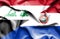 Waving flag of Paraguay and Iraq