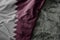 waving flag of qatar on the old khaki texture background. military concept