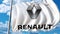 Waving flag with Renault logo against sky and clouds. Editorial 3D rendering