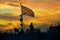 Waving flag of the russian navy on a warship of the baltic fleet against the backdrop of sunset