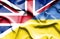 Waving flag of Ukraine and Great Britain