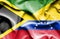 Waving flag of Venezuela and Jamaica