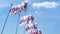 Waving flags with Coca-Cola logo against sky, editorial 3D rendering