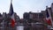 Waving flags in harbor of Honfleur, France