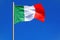 Waving Italian flag clear blue sky