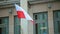 Waving Polish flag on Building close up