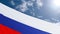 A waving Russian flag with a tricolor on the background of the sun and the sky with clouds. Banner for the Day of Russia on June