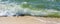 Waving sea and sand beach in summertime, web banner