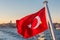 Waving Turkish flag against Istanbul Turkey