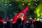 Waving Turkish Flags in a celebration at night. National days of Turkey