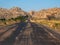 wavy asphalt road in a hilly landscape, southern Madagascar