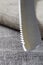 wavy blade of a steel knife