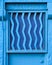 Wavy blue door closeup