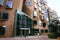 Wavy brick facade of Dr Chau Chak Wing Building with array of rectangular windows at University Technology Sydney UTS, Australia