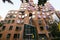 Wavy brick facade of Dr Chau Chak Wing Building with array of rectangular windows at University Technology Sydney UTS, Australia