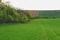 Wavy fairytale spring landscape with fields and sky. Spring landscape. Moravian Tuscany, south Moravia, Czech Republic
