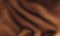 Wavy leather. Abstract brown leather background