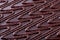 Wavy pattern chocolate cake surface close-up