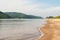 A wavy sand coastline, green wooded Zhiguli mountains and the riverbed of the Volga.