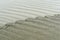 Wavy sand surface, sandy smooth sea shore, sand ripples